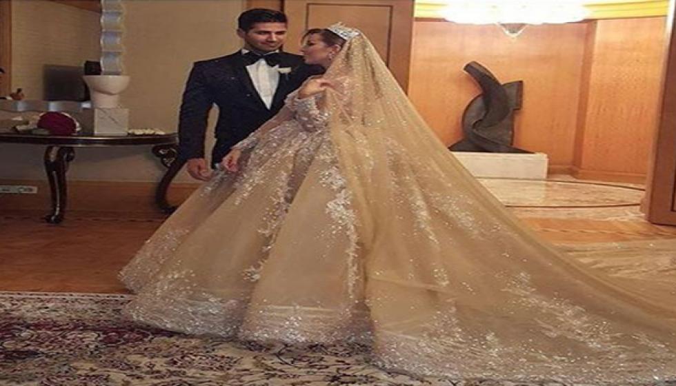 عروس ملك جمال لبنان بفستان من الماس